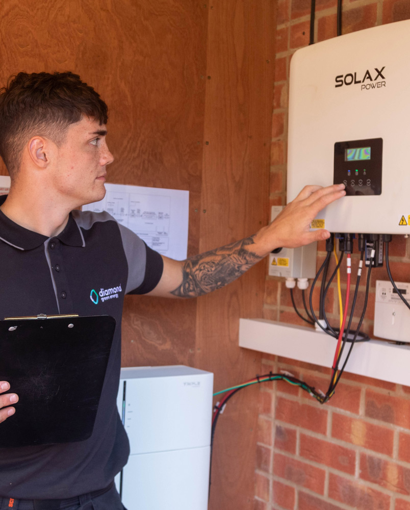 Diamond Green Energy engineer working on a Solar unit